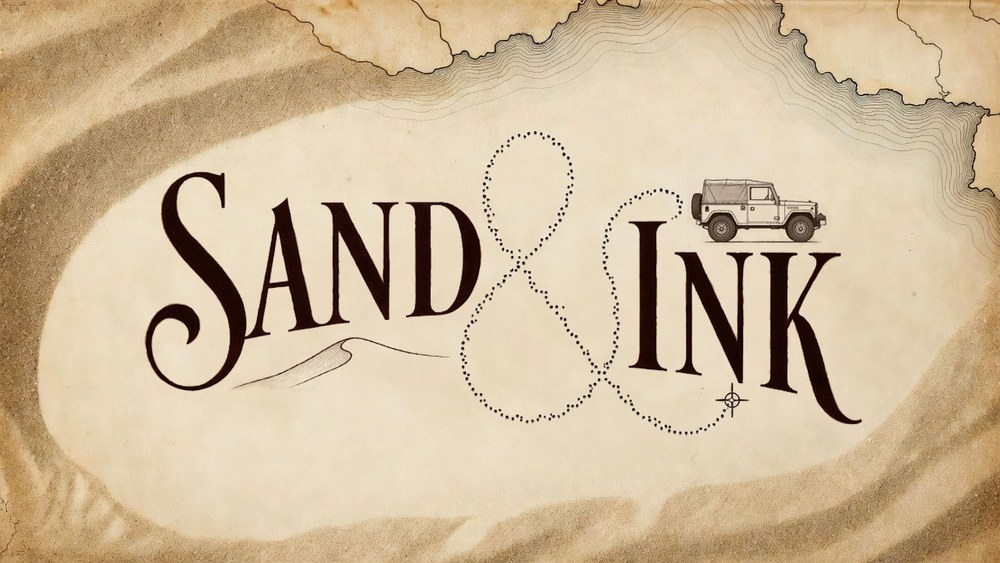 Sand & Ink logo: the words SAND and INK in sepia serif on old map paper, joined by a dotted route line with a Land Rover on top.